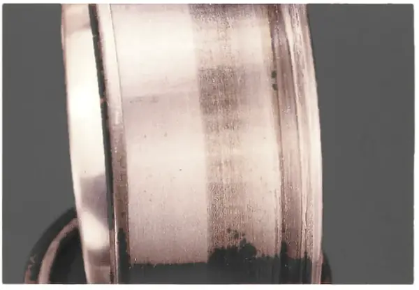 A tapered seat shows a heavier contact band where the fit is tighter.
