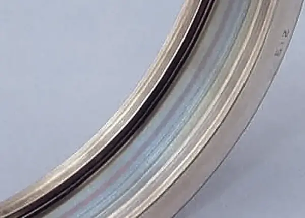 Heat discoloration on the raceway and cage guide surface.