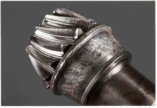 Bearing that ran with no oil: hot and dry, with little or no carbonised oil and heavy plastic deformation. In this case a plug had worked out of the housing.
