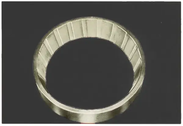Dents all round at roller spacing with grinding marks in the bottom: a ring pressed into position through the rollers.