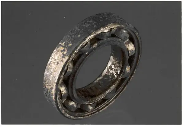 Atmospheric corrosion on a ball bearing.